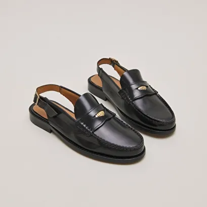 Slingback loafers with gold details in glazed leather