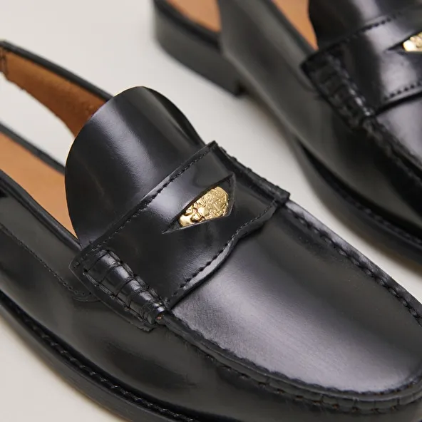 Slingback loafers with gold details in glazed leather